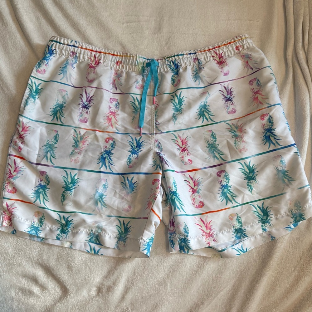 Chubbies White and Blue Pineapple Swim Trunks with Elastic Waistband